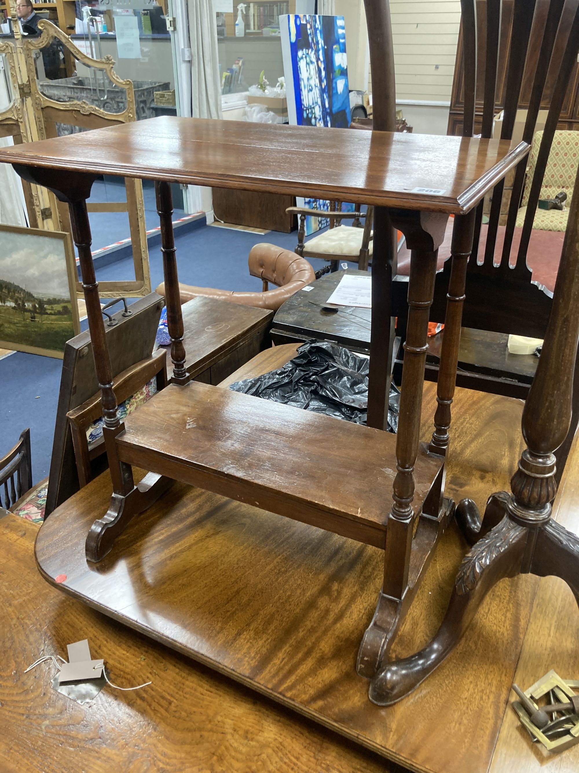 A 1920s mahogany tripod oil lamp standard, height 115cm and a two tier occasional table